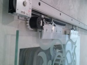 Дотягувач розсувних дверей Nitto NSC-60C Motion Sliding Door Closer