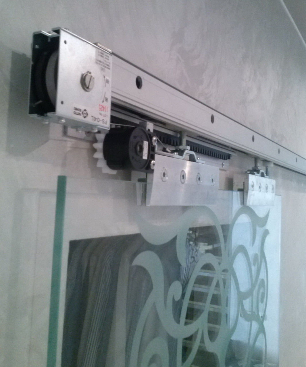 Дотягувач розсувних дверей Nitto NSC-60C Motion Sliding Door Closer